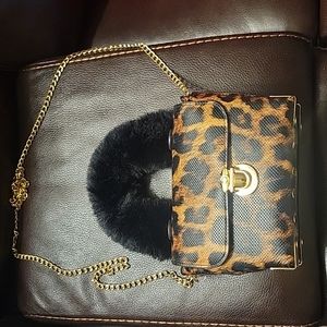 Lightly used leopard small purse.